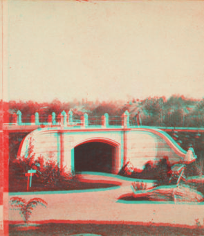 Granite arch over footpath south of playground. [1860?-1900?]