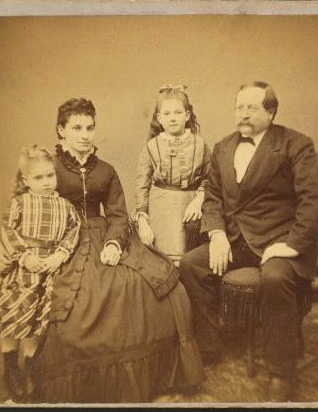 [Studio portrait of an unidentified family.] 1865?-1883?