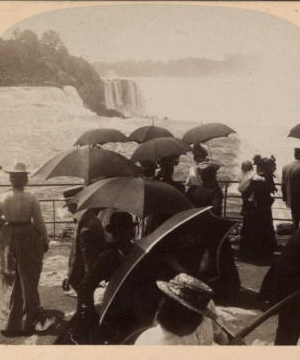 Admiring tourists viewing the falls, from Prospect Point, Niagara, U.S.A. 1902 c1901