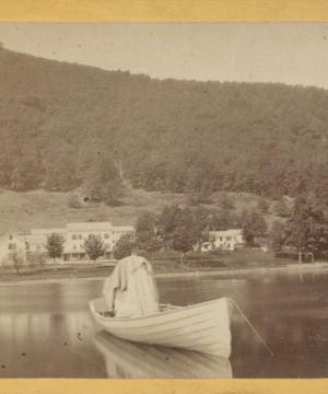 [View on lake of rowboat in foreground, buildings in the shore beyond.] [ca. 1870] [1865?-1885?]