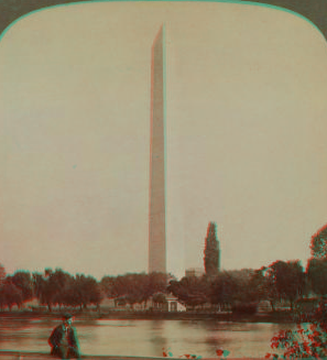 Washington Monument (555 ft. high) from N.W.) across one of the Fish Ponds, Washington, U.S.A.. 1902 1859?-1905?