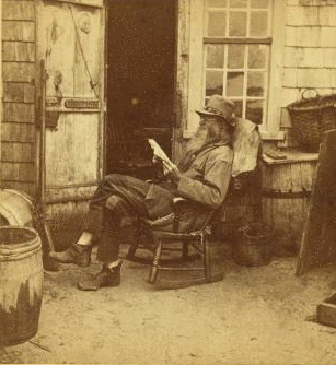 [View of the Hermit (Fred Parker?) in a rocking chair.] 1867?-1890?