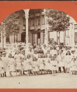 [Group of children in front of Grand Union?.] [1869?-1880?]