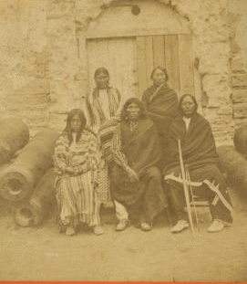 Group of the 3 most celebrated Indian Chiefs and 2 women prisoners, confined in the Old Spanish Fort. 1868?-1890? [1875-1878]