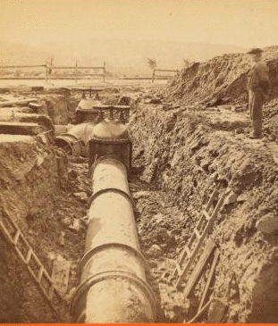 Oct. 31, 1877. View of gates on Sudbury River pipeline below effluent gate house, Chestnut Hill Reservoir, looking south. 1877 1876?-1878?