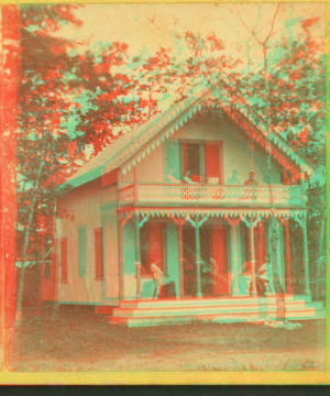 [People on the porch and balcony of a cottage.] 1865?-1885?