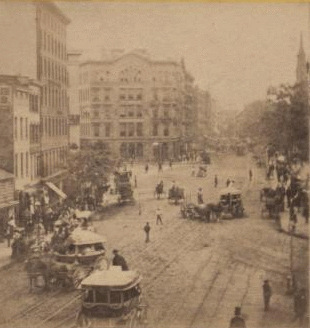 Park Row from Tryon Row, the City Hall Park on the right, showing the Times Building, and a distant view of St. Paul's Church. 1860?-1875? ca. 1865