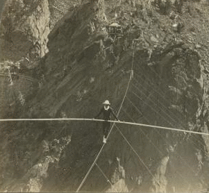 Ivy Baldwin breaking the record for tight-rope walking-rope 580 feet high and 555 feet long, near Boulder, Colo. c1907 1865?-1907