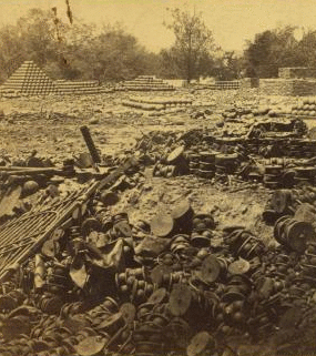 View in the arsenal grounds, near the Petersburgh R. R. Bridge, Richmond, V[a] showing shot, shell, and canister [sic] scattered around. 1861-1865