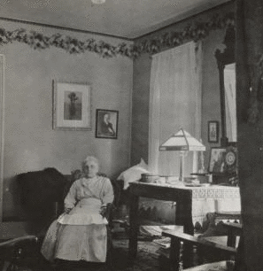 [View of a woman sitting.] 1915-1919 December 1915