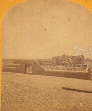 Roman Catholic church, Plaza of Guadeloupe, Gouadeloupe Co., Colorado. Built not many years since of adobes. Dimensions: length 120 feet; width 60 feet; height 25 feet. Grave yard in the foreground surrounded by an adobe wall about 6 feet in height. 1874