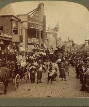 Fun makers on the crowded Pike - a street enticing "shows". St. Louis, Mo. 1903-1905