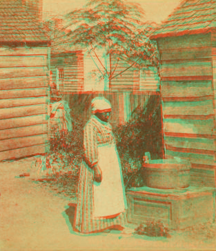 [Woman with wash tub.] 1868?-1900?