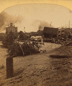 From the rear of the P. R. R. depot looking toward the Stone Bridge, where so many people were burned to death. 1889