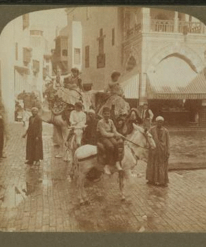 Picturesque natives of Egypt in the crooked streets of "Cairo," World's Fair, St. Louis. 1903-1905