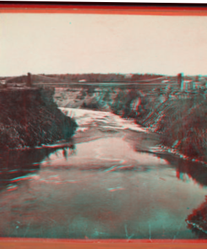 [Suspension Bridge, Niagara. Distant view, spanning the river.] [1859?-1870?]