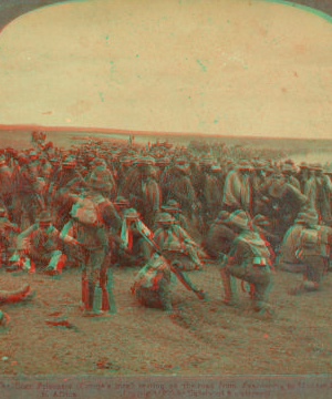 The Boer prisoners (Cronje's men) resting on the road from Paardeberg to Modder River, S. Africa. 1900