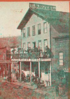 Petroleum Centre. [View of U.S. Hotel and shops.] [1860?-1910?]