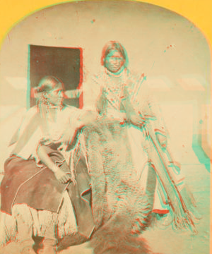 Jicarilla brave and squaw, lately wedded. Abiquiu Agency, New Mexico. 1874