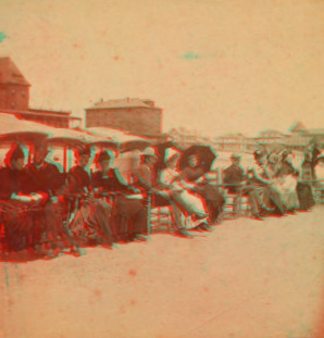 [People sitting in chairs on the beach, Old Orchard Beach, Maine.] 1869?-1880?