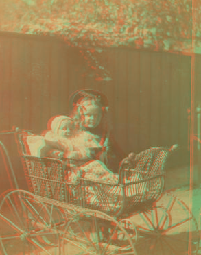 [View of a child and a baby in a stroller.] 1865?-1899