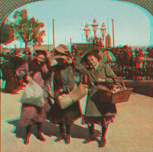 Light hearts and heavy burdens leaving the long bread line at St. Mary's Cathedral. 1906