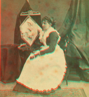 [Caroline S. Brooks and her sculpture in butter during a public exhibition at Armory Hall in 1877.] 1877 1859?-1885?