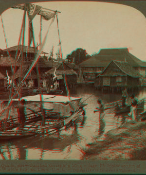 Quaint, straw-thatched houses of a Moro village, Philippine section of the World's Fair. 1903-1905