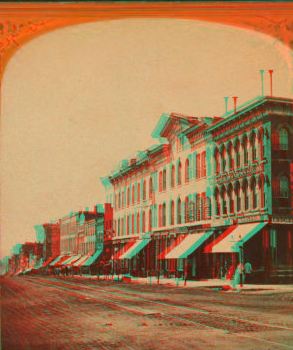 Peoria: block of buildings opposite west side of courthouse square. 1865?-1900?