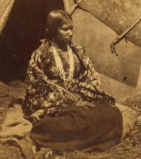 [Portrait of native American woman in front of teepee.] 1862?-1875?