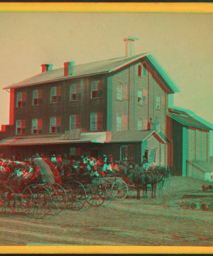 [Large group of people in buggies and wagons at C.P. Chapman's flouring mill in Pittsfield.] 1870?-1895?