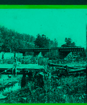 The Iron Bridge and ruins of Old Mill, near Spence Creek, Huntington Co. 1860?-1870?