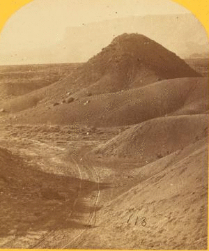 The "Vermillion Cliff," a typical plateau edge, as seen from Jacob's Pool, Arizona. 1872