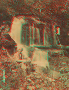 [Man sitting near the waterfall.] 1863?-1885?