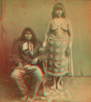 [Portrait of Indian man and woman, with playing cards.] 1865?-1885?