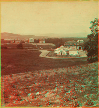 [View of the Massachusetts Agricultural College, showing fields and the plant house.] 1869?-1880?