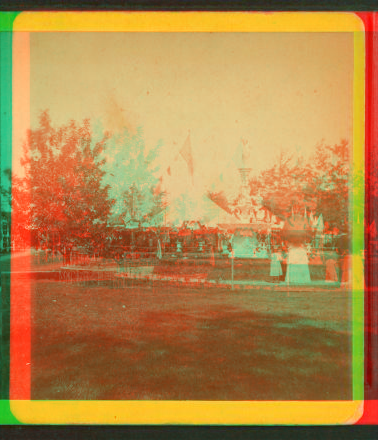 [Decorated tent in recently landscaped park.] 1860?-1915?