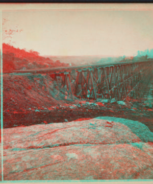 View looking south-east on the Trestle Bridge, at East Tarry Town, N.Y. on the New York, Boston & Montreal  Railway. [ca. 1873] [1865?-1915?]