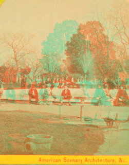 [Men and women posing around unidentified fountain.] 1865?-1885?