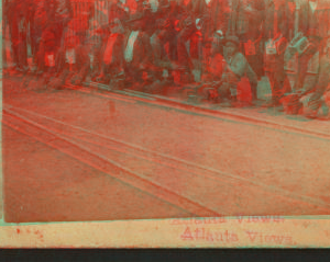 [View of African American shoe shine boys posing along the streetcar tracks.] 1870?-1900? [ca. 1887]