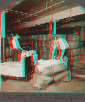 Opening bales of raw silk as it arrives from China, Japan and Italy. Silk industry (reeled silk), South Manchester, Conn., U.S.A. c1914 1914