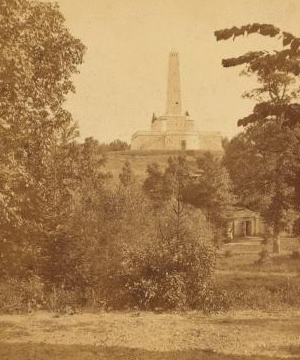 National Lincoln Monument, Springfield, Illinois. View from a point slightly east of north from the Monument, and across a ravine running east and west through Oak Ridge Cemetery. 1870?-1917