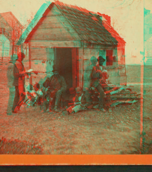 Uncle Abe's schoolhouse and scholars. [Man in a top hat in front of a shack with several boys with books.] 1868?-1900?