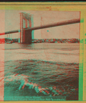 Brooklyn Bridge, New York. (Taken from ferry boat under full headway.) [1867?-1910?]