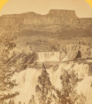 Shoshone Falls, Snake River, Idaho, looking through the timber, and showing the main fall, and upper or "Lace Falls." 1874