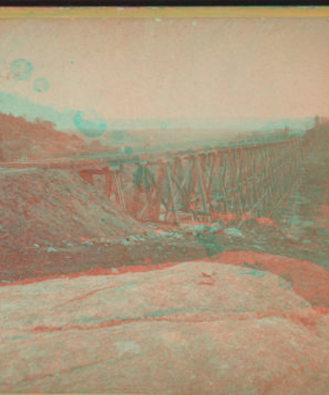 View looking south-east on the Trestle Bridge, at East Tarry Town, N.Y. on the New York, Boston & Montreal  Railway. [ca. 1873] [1865?-1915?]