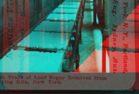 Conveyor with trays of loaf sugar received from drying kiln, New York. [1862?-1915?]