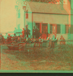 [Group portrait of people in front of a house.] 1865?-1885?