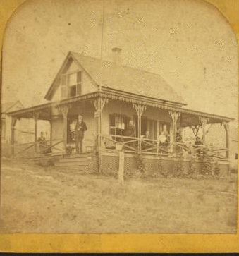 [Group on the porch of a cottage.] 1859?-1885?
