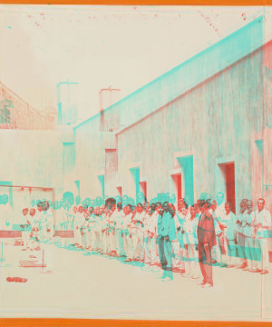 Prisoners in Courtyard of Prison in San Juan, Porto Rico. [ca. 1900]